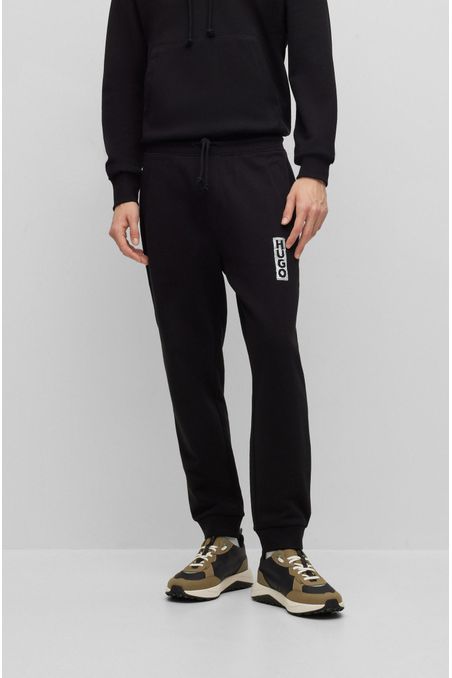 PANTALONES DE BUZO RELAXED FIT DE ALGODÓN CON LOGO HOMBRE