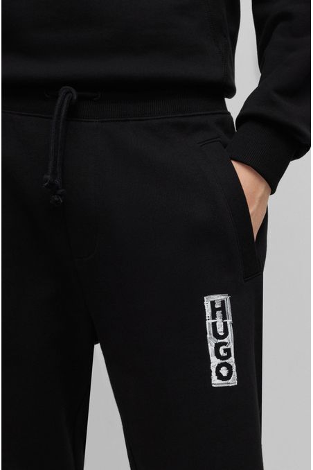 PANTALONES DE BUZO RELAXED FIT DE ALGODÓN CON LOGO HOMBRE