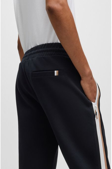 PANTALONES DE BUZO REGULAR FIT DE ALGODÓN HOMBRE