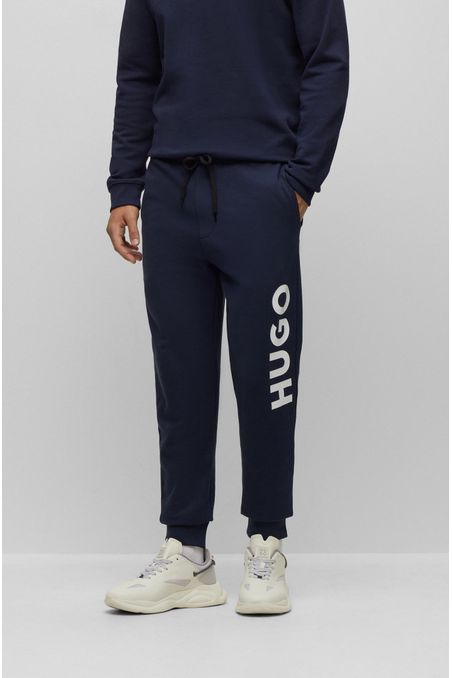 PANTALONES DE BUZO CON LOGO EN CONTRASTE HOMBRE