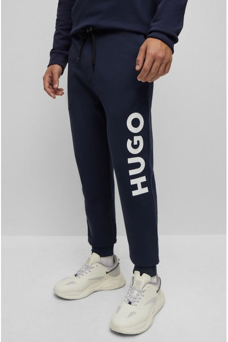 PANTALONES DE BUZO CON LOGO EN CONTRASTE HOMBRE