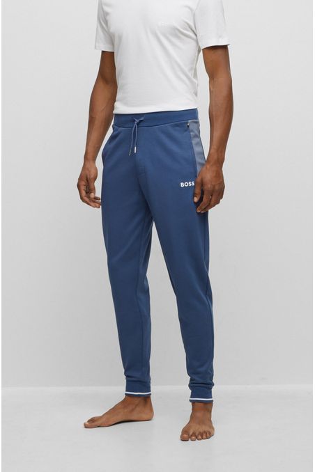 PANTALONES DE BUZO CON LOGO BORDADO HOMBRE