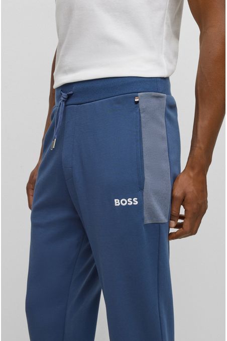 PANTALONES DE BUZO CON LOGO BORDADO HOMBRE