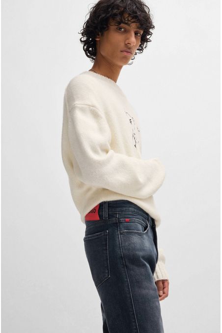JEANS SLIM FIT DE DENIM ELÁSTICO CON EFECTO DESGASTADO HOMBRE