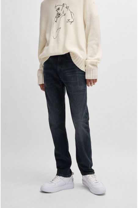 JEANS SLIM FIT DE DENIM ELÁSTICO CON EFECTO DESGASTADO HOMBRE
