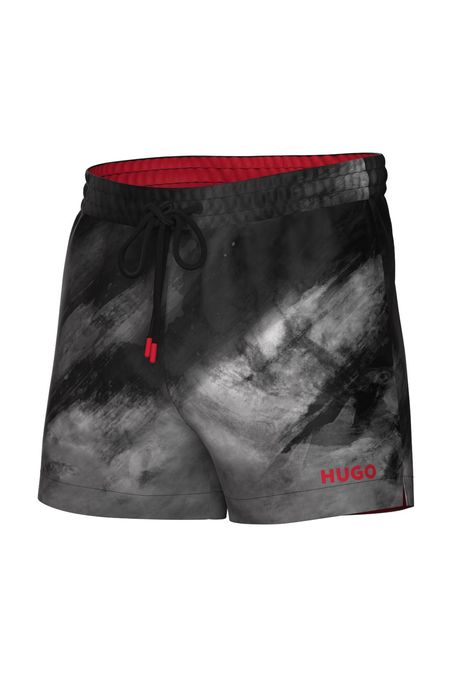 TRAJE DE BAÑO TIPO SHORT ESTAMPADO HOMBRE