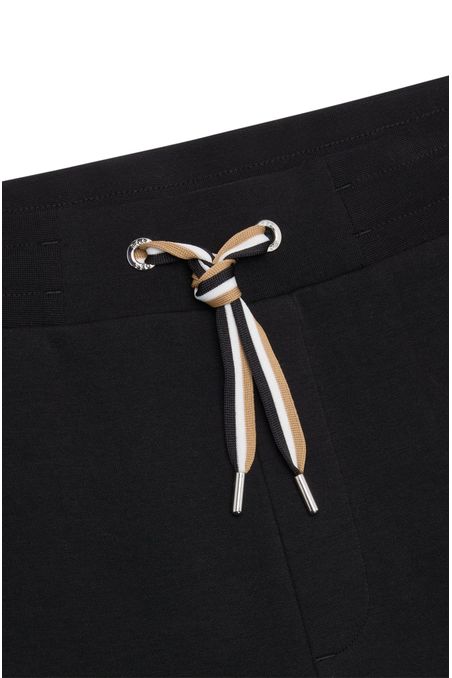 PANTALONES DE CHÁNDAL DE ALGODÓN CON RAYAS DE LA MARCA EN EL CORDÓN PANTALONES REGULAR FIT HOMBRE