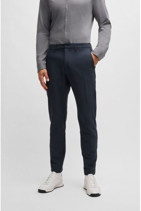 PANTALONES REGULAR FIT DE TEJIDO ELÁSTICO REPELENTE AL AGUA PANTALONES CASUALES REGULAR FIT HOMBRE