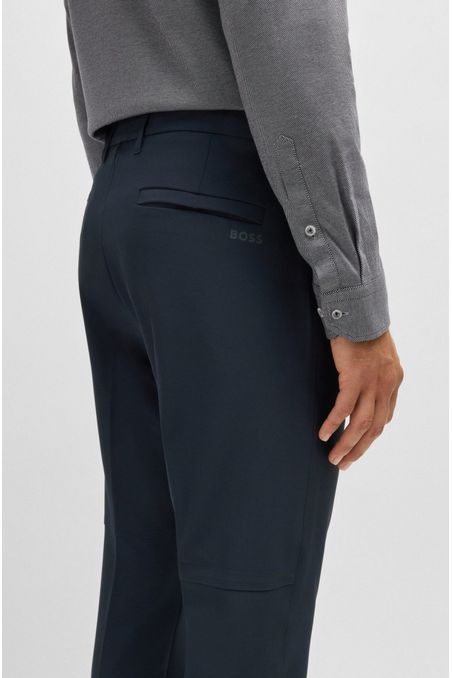 PANTALONES REGULAR FIT DE TEJIDO ELÁSTICO REPELENTE AL AGUA PANTALONES CASUALES REGULAR FIT HOMBRE