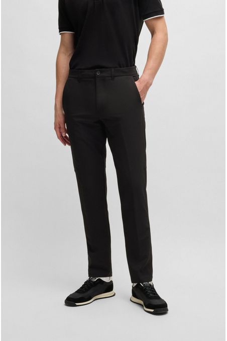 PANTALONES REGULAR FIT DE TEJIDO ELÁSTICO REPELENTE AL AGUA PANTALONES CASUALES REGULAR FIT HOMBRE