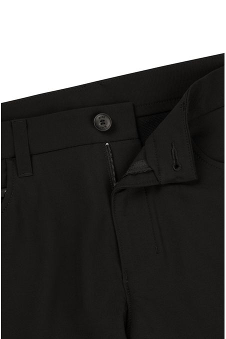 PANTALONES REGULAR FIT DE TEJIDO ELÁSTICO REPELENTE AL AGUA HOMBRE