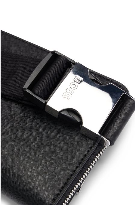 Bolso cruzado con estructura y ribetes de la marca