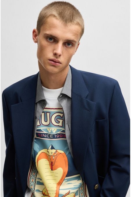 POLERA DE PUNTO DE ALGODÓN CON ESTAMPADO GRÁFICO PLAYERA OVERSIZE FIT HOMBRE