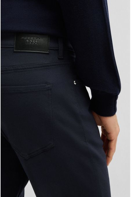 VAQUEROS PORSCHE X BOSS TAPERED FIT DE TEJIDO VAQUERO ELÁSTICO TÉCNICO EN TONO AZUL JEANS TAPERED FIT HOMBRE