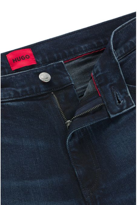 JEANS SLIM FIT EN DENIM ELÁSTICO AZUL OSCURO JEANS SLIM FIT HOMBRE