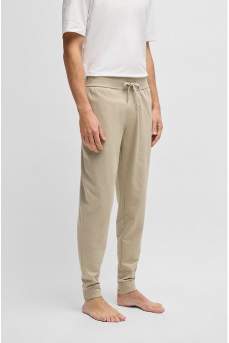 PANTALONES DE CHÁNDAL EN FELPA DE ALGODÓN CON CORDÓN Y LOGO ESTAMPADO PANTALONES HOMBRE