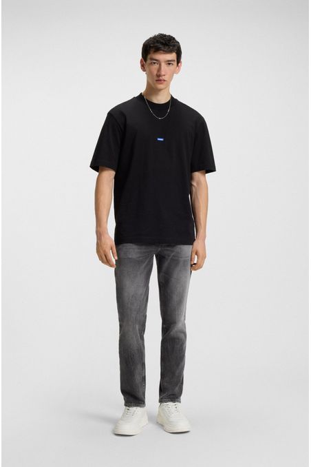 JEANS TAPERED FIT DE DENIM ELÁSTICO GRIS OSCURO JEANS TAPERED FIT HOMBRE