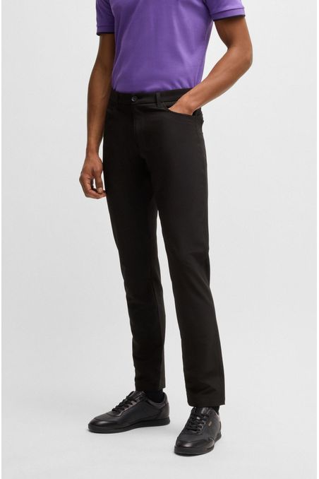 PANTALONES REGULAR FIT DE TEJIDO ELÁSTICO REPELENTE AL AGUA HOMBRE
