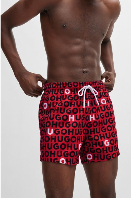 TRAJE DE BAÑO TIPO SHORTS CON FORRO INTEGRAL Y LOGOS REPETIDOS HOMBRE