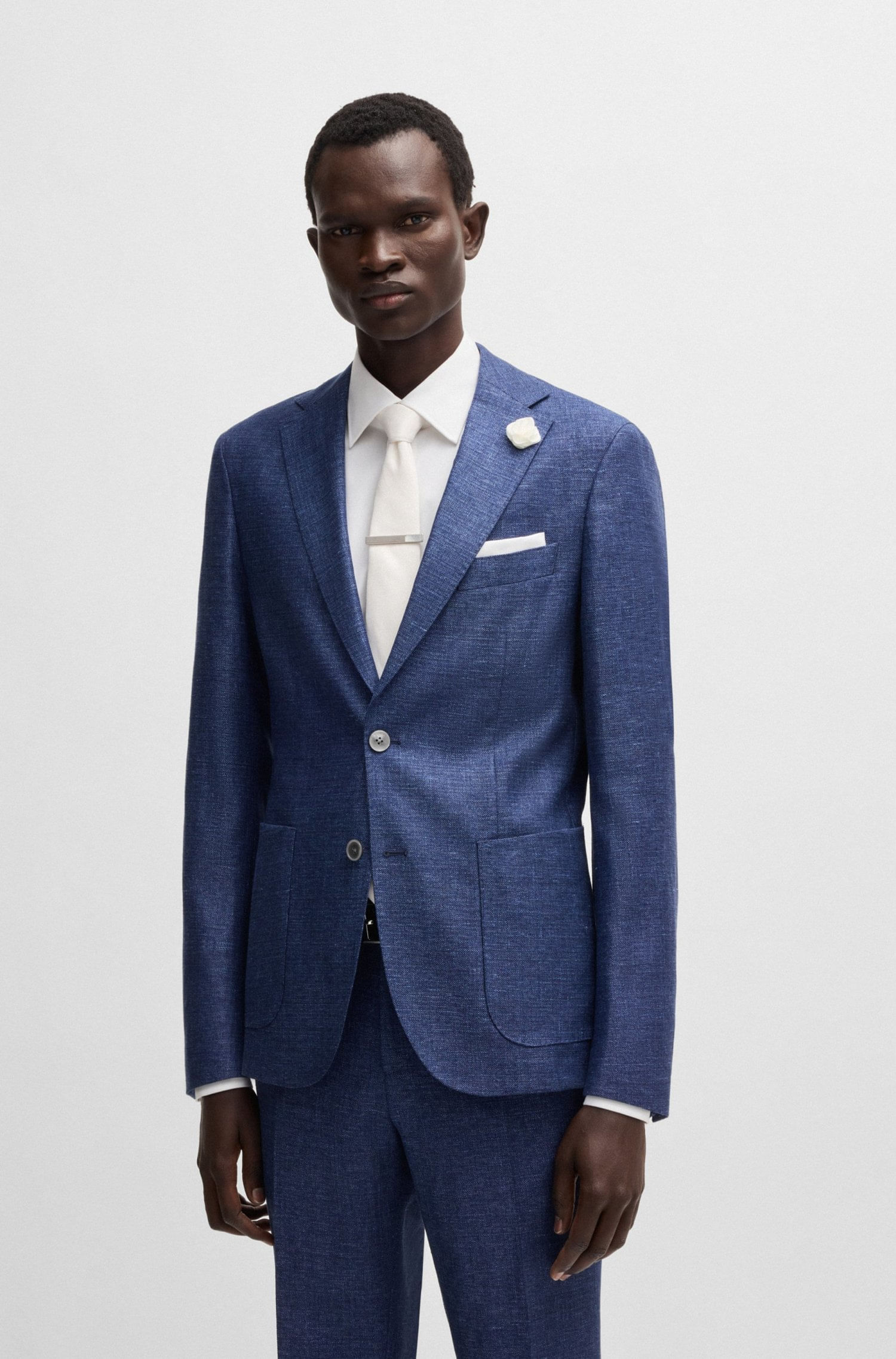 BLAZER SLIM FIT EN TEJIDO CON MICRODIBUJO BLAZERS SLIM FIT HOMBRE