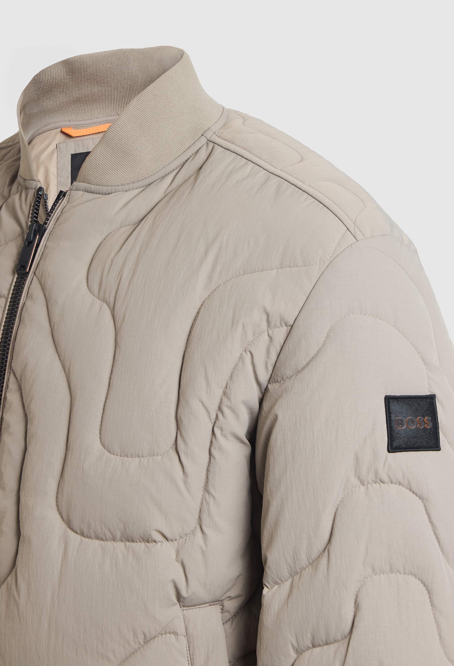 CAZADORA EN MEZCLA DE MATERIALES CON RELLENO DE PLUMÓN CHAMARRA REGULAR FIT HOMBRE